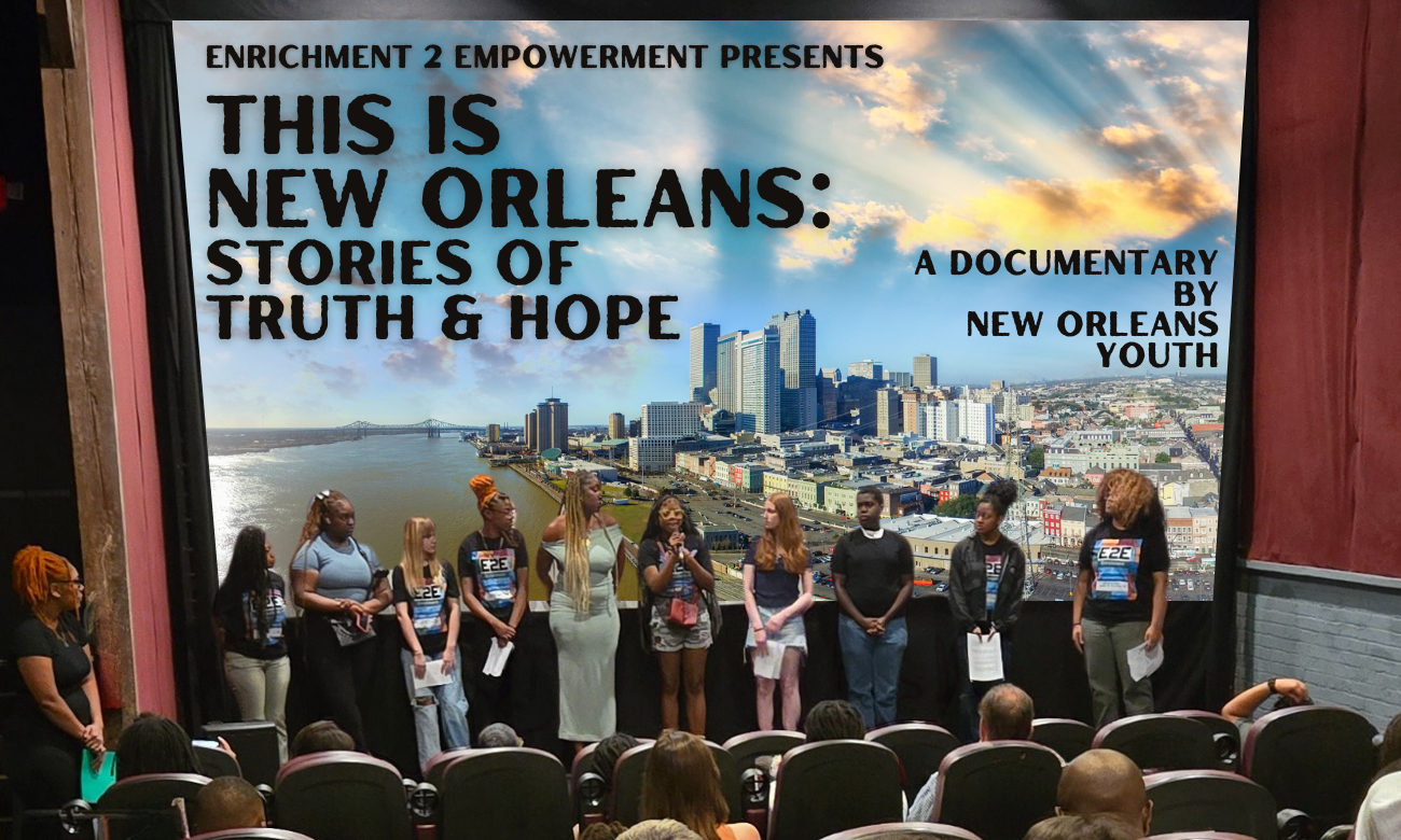 Young people stand in front of a movie screen sharing insights on their film - This is New Orleans.