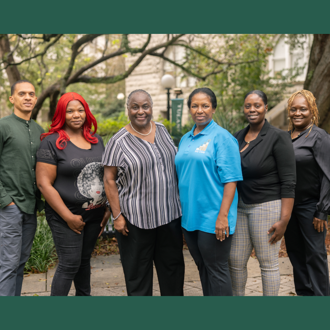 Marva Lewis (third from left), an associate professor in the Tulane School of Social Work, is partnering with University of Chicago Medicine on a study that aims to help trauma-exposed children and families. She is joined by her team of researchers (from left to right) Michael Gavion, Tameka Cannon, Dale Robinson-Rogers, Annie Laura Hill, Alita Cusher. Not pictured Marcquitte Smith. (Photo by Kenny Lass)