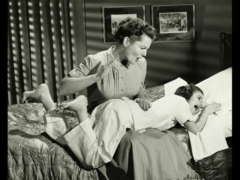 Still shot of old movie showing spanking