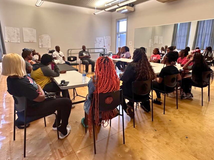 Participants of VPI's E2E program listen to guest speakers